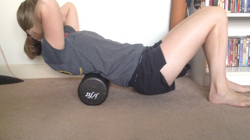 Back massage using foam roller