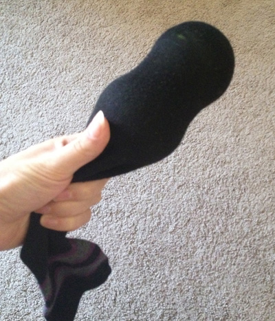 2 tennis balls inside a sock for massaging