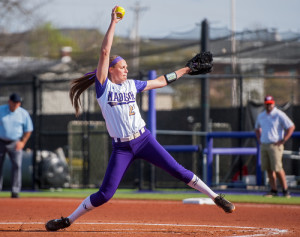 (4/29/15) - (Harrisonburg) James Madison freshman Megan Good delivers a pitch to Virginia Tech. (Daniel Lin/Daily News-Record)